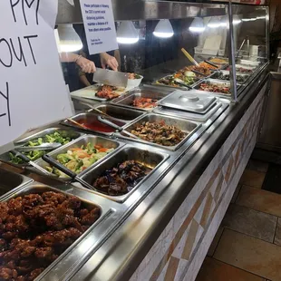 a buffet with many different types of food