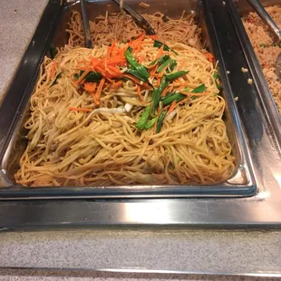 a plate of noodles and vegetables