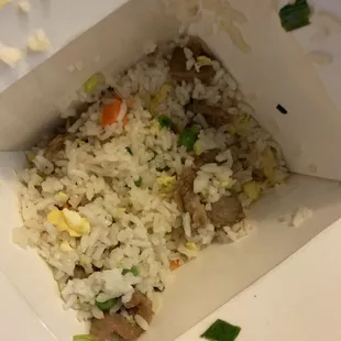 Fried rice but its just white rice with meat and veggies thrown in.