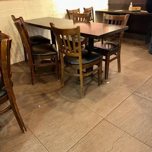 a table and chairs in a restaurant