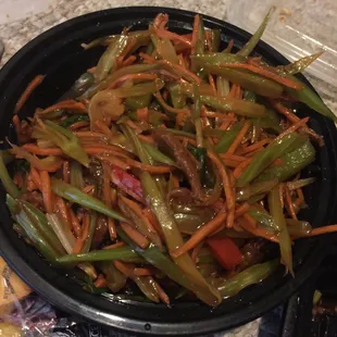 a bowl of stir fried vegetables