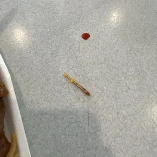 Toothpick found in my orange chicken and stabbed the inside of my mouth
