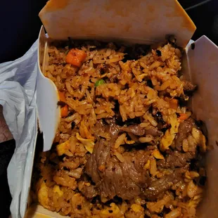 I ordered spicy beef fried rice with Sriracha. It comes with real beef flank not that gray rubbery stuff