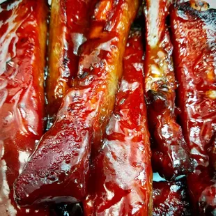 a close up of a plate of ribs