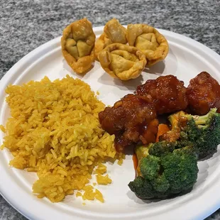 &quot;Orange&quot; Chicken, fried rice and wontons.