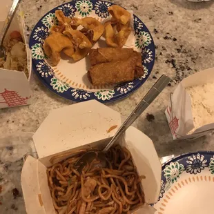 a table full of chinese food
