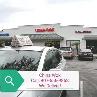 cars parked in front of a chinese restaurant