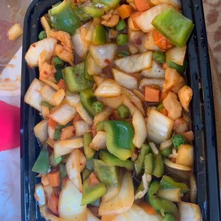 a tray of stir fried vegetables