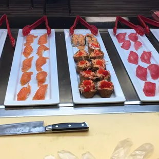 a variety of sushi and rolls