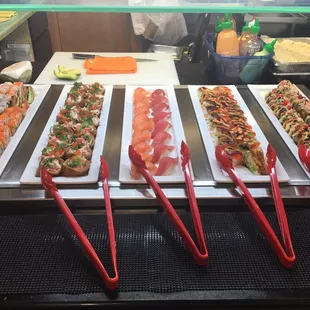 a variety of sushi and rolls