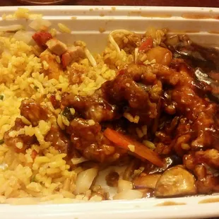 chicken and rice in a styrofoam container