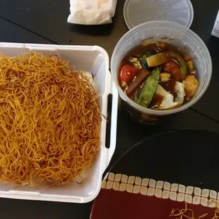 Pan Fried Egg Noodle dish served takeout style. Beware, noodles are crispy! (was expecting flat soft egg noodles)