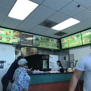 a man and a woman ordering food