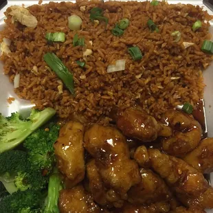 General Tso chicken with a side of broccoli.