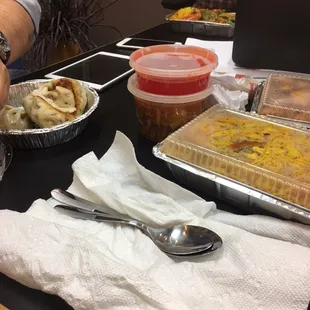 Complete order of fried dumplings, shrimp Hunan (back), hit and sour soup/sweet sour sauce, and mei fun noodles to the right.