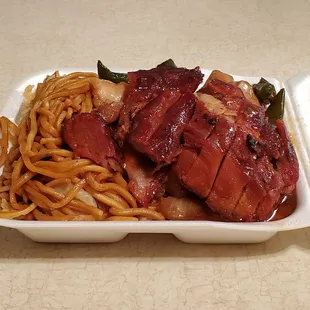 a meal in a styrofoam container