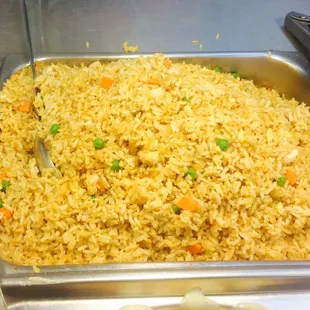 a tray of rice and vegetables