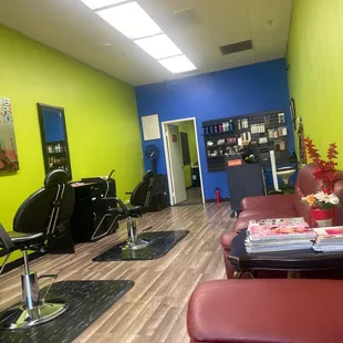 a salon with chairs and tables