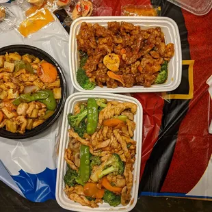 Orange chicken, chicken with mixed vegetables and Kung Pao chicken
