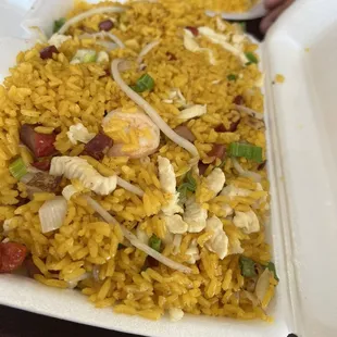 a plate of rice and vegetables