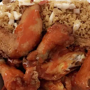 chicken wings and rice in a styrofoam container