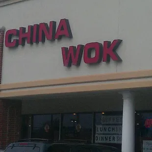 a car parked in front of the store