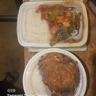 two take out containers of food
