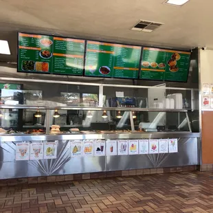a restaurant counter with menus