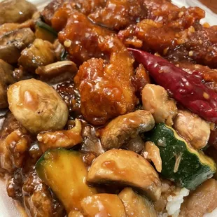 a plate of chicken and vegetables