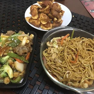 three plates of food on a table