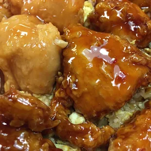 General Chicken &amp; Sweet and Sour Chicken on a bed of Egg Fried Rice.  The BEST in Joplin!