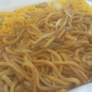 noodles and vegetables in a styrofoam container