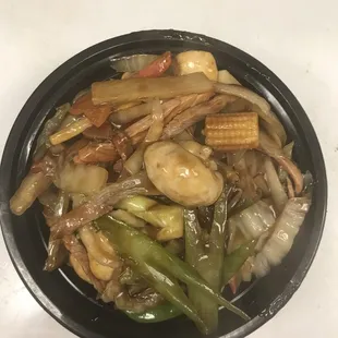 a plate of stir fried vegetables