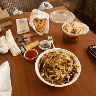 a table full of food and drinks