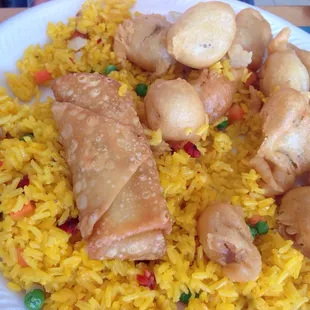 Sweet n Sour pork with fried rice and an egg roll.