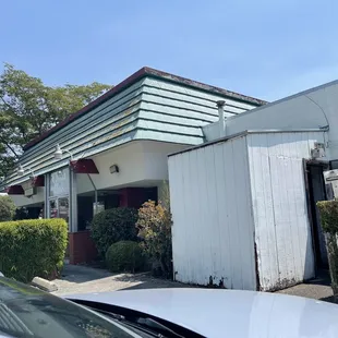 a car parked in front of a building