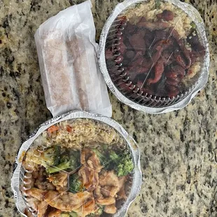 two take out containers of food