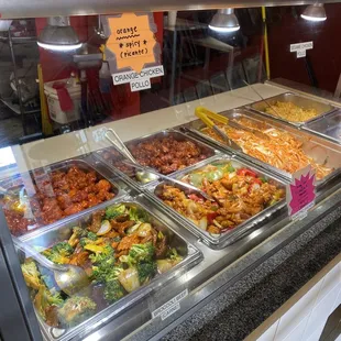 a variety of food items in a display case
