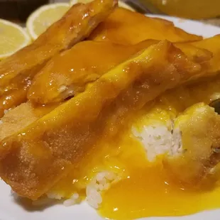 Chicken not done, sticker left on lemon but didn't add any flavor to that bland mess.