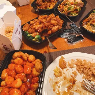 a table full of chinese food