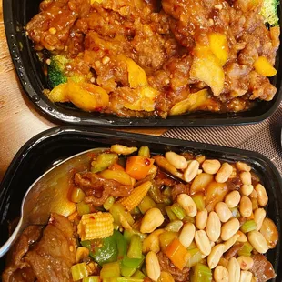 two take out containers of food