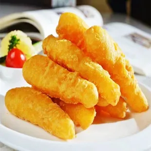 a pile of fried tater tots on a plate