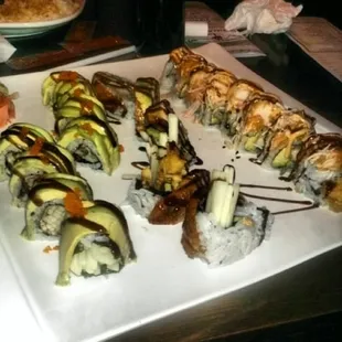 I would recommend "The American Dream" roll -  shrimp tempura, crabmeat, avacado topped with eel sauce &amp; calamari (far right)