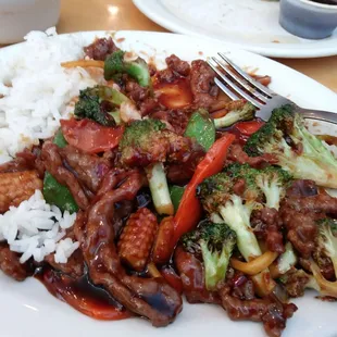 Garlic beef with steamed rice.