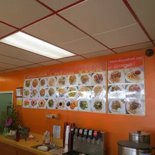 menus on the wall of a restaurant