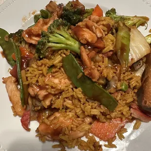 Half of the portion of chicken and vegetables with pork fried rice