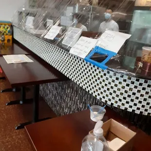 Plastic barrier and sanitizer