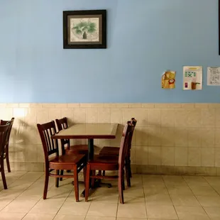 a man sitting at a table in a restaurant