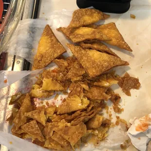 a pile of tortilla chips on a counter