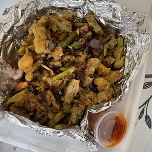 chicken and vegetables in foil